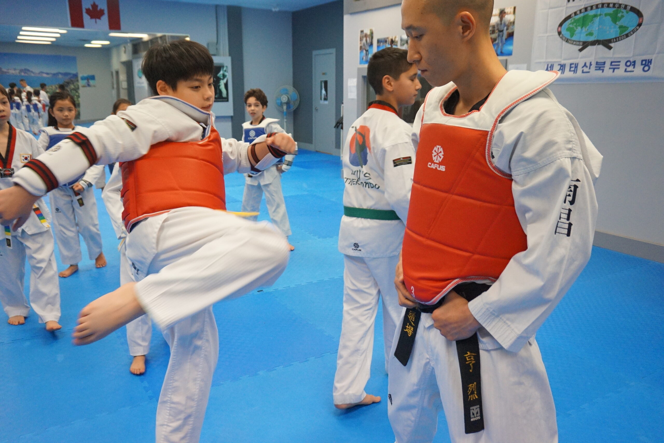 //ryustaekwondo.com/wp-content/uploads/2023/01/sparring-5-scaled.jpeg